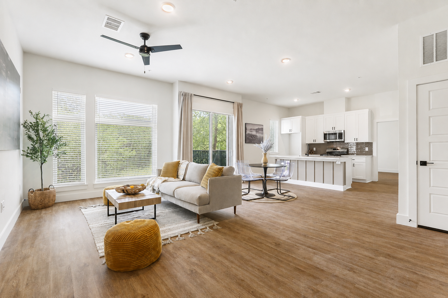Bright open-concept living space at East Grove